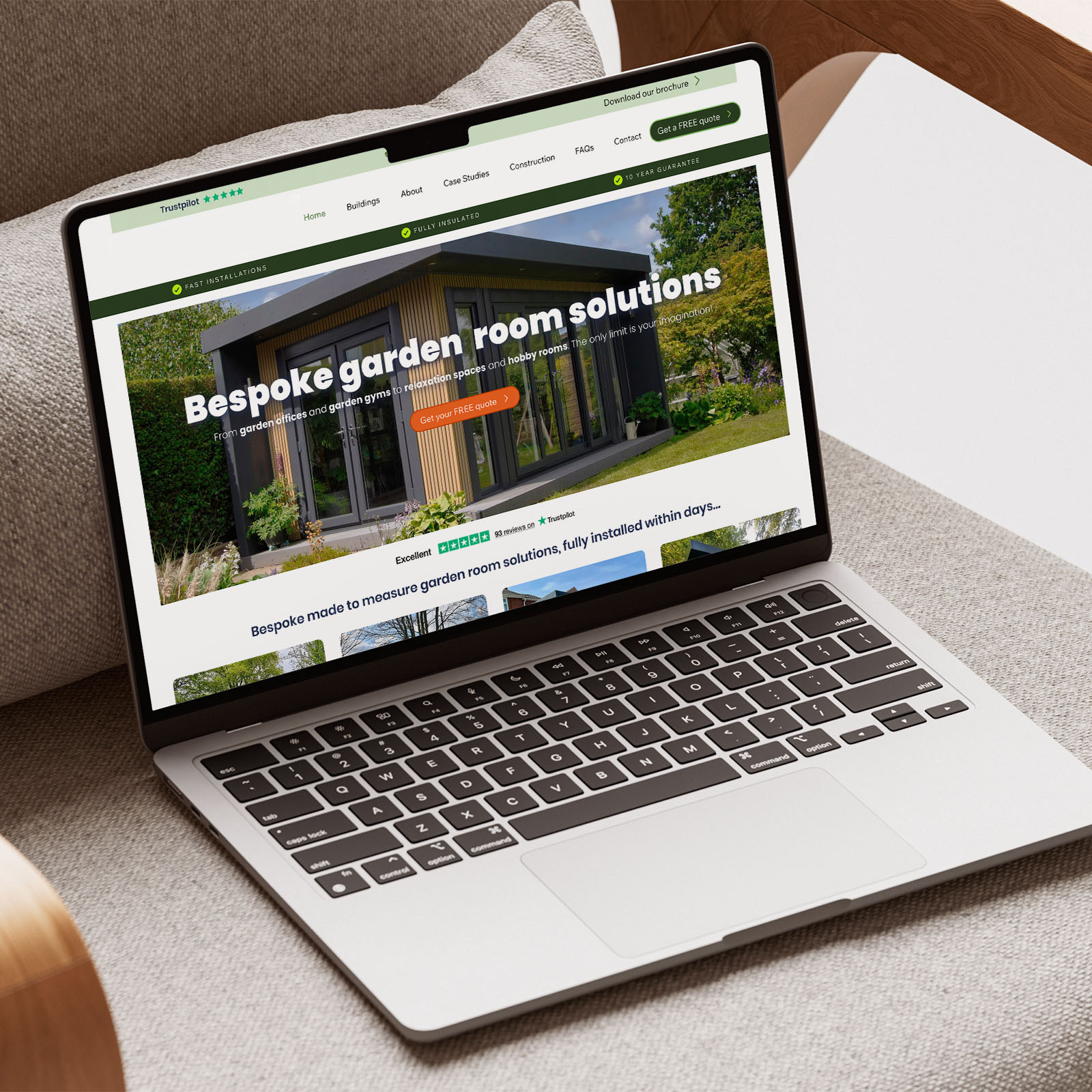 Cosy Garden Rooms website on laptop